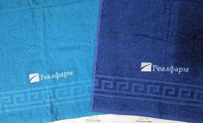Вышивка логотипа на полотенцах 